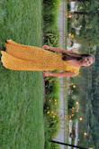 I love this dress! I had to take it to the seamstress to get its hemmed because it was super long but I'm short so that always happens. She also fixed the back because it was a little gappy. But after the alterations it fits perfectly and I love the color and the fabric is light and flowy. - Kelly K.
