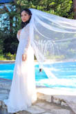 I love the dress. It make my bust look big lol. The material is good quality. Only one issue that is the end rip off very easy since you it drag over the floor. But it's a nice dress with the price. - Chananya J.