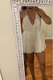 I reallyyy wanted to like this for my bachelorette party, but it was a little too small for me. I usually order a small, but after I adjusted the straps, the torso became too small and the bottom of the romper was digging upwards and my buttcheeks were very visible. I probably could have used a medium, but since I have a smaller chest, it would have been too big up top. It also had a look that felt more like a pijama/lingerie and not something for me, but cute otherwise! - Tiffany P.