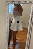 I loved this dress! I wore it for a night out and it was perfect. Super comfortable and can't wait to wear it again. It flows right and fits just perfect, and the material was very nice. It does hug my belly a little too much but I was okay with that! - Tiffany P.