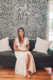 I wore this to my bridal shower and it was absolutely perfect! I got so many compliments! I did have the bottom hemmed because I wanted it to hit my ankles and not the floor! - Stephanie P.