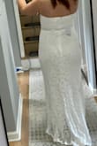 I originally bought this to wear for our quick court wedding next month before our big ceremony and reception next year, it fit great and looked amazing! So comfortable and easy to move in as well. I did decide to go with a shorter dress just because I don't want our court wedding to "feel" like a wedding and take away from our big day next year. I was sad to return it though because I absolutely loved it! - Jessica B.