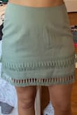 This skirt was super cute and fit great. I am usually as XS/S (waist 26') depending on how I want the fit, so I opted for the XS for a bit tighter. It fits perfectly around my waist and hips. Good quality. - Chelsea D.