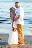 I think the pictures speak for themselves...the dress is gorgeous! Every person who has seen it or our pictures has raved about it. I felt so beautiful on our special day. The only things I had to do to the dress was hem the length and have cups sewn in for extra support (I'm a mom). Everything else fit me to a T. I'm so glad I picked this dress. I would wear it again and again if I could! - Sarah J.