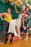 This dress was perfect for my bridial shower. It was very long, but was the perfect length with heels. In my pictures attached, I wasn't wearing heels, so you can see it lying on the ground. Material was soft and comfortable. The slit up the leg was a nice touch too! - Chelsea C.