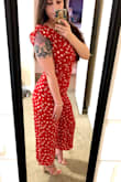 I love everything about this! I'm so short so it's hard to find cute jumpsuits that aren't too long for my legs and this did not disappoint. The color and the pattern are perfect, just as pictured. It's a little tight up top but I'm very large chested on a small frame so I wouldn't change the size. The only thing is you might need a buddy to zip and unzip you if you're gonna wear it out or to an event. - Teagan W.