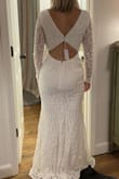 This was my runner up when trying on dresses. Ultimately it was the lack of the nude under slip that made me go with the other dress but this dress is beautiful! Great quality, if I kept this one I would have had to take it in a little on the top because I'm small up top and larger on the bottom, so if you have a bigger chest this would probably be a good option, without having to do alterations. The back is perfect. - Kathryne B.