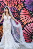 This White Embroidered Lace Trumpet dress was absolutely perfect for my beach wedding!! It come's neatly packaged in its own garment bag. I received many compliments!! You won't regret purchasing this dress. Definitely a 10/10. - Danielle V.