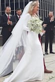 This dress is gorgeous for a great price. Material is stretchy so if you can size down- do it. I ordered an XS and wish there was an XXS option. I had the dress hemmed, sleeves shortened, and shoulders shortened for my wedding day and it was stunning! I also added a mermaid slip that was puffy at the bottom to help the dress hold it's shape. - Catherine B.