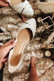 Absolutely love these shoes in both the Ivory and Tan colors! Stylish and classic, these flats will easily transition from summer to fall and from the office to evenings.

The fit was spot-on for sizing, but the heel can be a bit tight on the first few wears. Just be sure to wear them in a bit before trying to go all day or dancing all night and you should be fine.

All in all, these are a great pair of flats that pair great with any outfit and I've already received several compliments. Excited to wear them for work, weddings, date nights and more all year long!

Cheers! -Jamie Lynn @browneyedlovely - Jamie O.