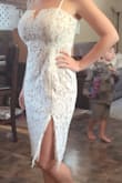 This dress is perfect! I sized up to M to make sure it wasn't skin tight, and I could have gotten away with a Small. But it still fits great. I waited weeks for my size to get in stock and when it did delivery was quick to! This dress will be perfect for any occasion! I'll be using it as my courthouse wedding dress. - Melissa H.