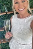 Wore this for my bridal shower and received tons of compliments! The open back is adorable. I ordered a small and XS and ended up going with the XS. Love love love this dress!!! - Carly S.