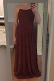 Gorgeous! Great material, love the color. It's very long so definitely need it hemmed, which I expected. True to size, little to no stretch so I recommend measuring yourself. - Alyssa W.
