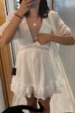 Super cute dress, it is a little low cut in the front but still fits perfect! - Hayden N.