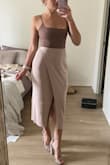 This might be THE most comfortable skirt I have ever worn in my life. It feels like wearing the world's softest blanket, but somehow still looks great. My sister has already stolen it for a night. - Lauren U.