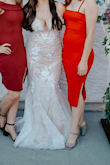 The dress was perfect and light weight. I was able to walk around comfortably and got lots of compliments on my dress! - Zulema G.