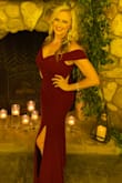 I can't say enough good things about this dress! It was good quality material, that was a bit stretchy (forgiving/comfy) and it was lined with a slip inside already. It runs long and I had to have it hemmed. I am top heavy so I ordered both a medium and a large to try. I ended up having the medium fit my body like a glove and the length was perfect, but wouldn't fit my chest/shoulders. So I went with the large and had it hemmed and brought in at the waist. Well the tailor brought it in TOO much so I had to resort to no strapless bra underneath which made me nervous at first but as you can see it looked very nice and I was actually secure in it! It was a stunning dress that turned heads and collected many compliments! I highly recommend! (My boyfriend couldn't make the event due to work - so I put him on a stick - LOL) Enjoy! - Brandy B.