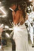 I was nervous buying my reception dress online but couldn't shell out a huge budget after buying my first dress. Let me tell you, this beauty exceeded my expectations so wildly!!! I actually got tears putting it on, it came only a couple weeks before my big day and the quality is impeccable. I thought I would have to take in the waist or shorten it a bit myself but it was literally perfect, fit me so nicely!!! It's so amazingly soft and was perfect for dancing and being comfy for my reception. Whatever you do, JUST BUY THE DRESS. You won't regret it seriously. I don't have my wedding photos yet but here's what I have so far, I was just too excited to share about this baby! - Sylvia T.