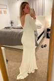 Absolutely in love with this dress. It is everything I wanted and more. The material is so comfortable and it fit like a glove. The sleeves could use a little altering because they were a little loose. Seriously best purchase ever. So happy with this dress. - Heather W.