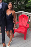 This dress might be my favorite from Lulus yet! I wore this to an end of August wedding and it was just the right amount of fun and classy with the high/low hem and lace details. The straps are adjustable and criss cross  so it was nice because there really isn't a way to wear a bra without it showing. If you are large chested this might be an issue. There is not a lot of stretch in the material. I usually wear a small, got a small and it fit "just right". If you are in between sizes I would size up. Overall beautiful dress and got so many compliments! - Annette S.