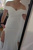 Ok, the Bust selection is a dropdown menu and they don't have my size. I am an extremely awkward 28HH in the bust, meaning that dresses usually just don't fit me. But this one is GORGEOUS and I am so obsessed with it. I had a picture in my head of what I hoped my rehearsal dinner dress looked like and this is 1000% it. 

Fit notes: 
- Bust is tight on me (duh, for a 28HH) but works well once zipped in. I'm wearing a strapless bra.
- Lower part is snug and stretchy, not at all uncomfortable
- Skirt is a bit flowy and moves beautifully. A little long on me with short heels, but I won't be tripping over it, so I'm not getting it hemmed.
- Dress has two layers, and is not at all see-through. I have black shapewear on in the pictures, and you can't tell at all. 
- I found that it also could work strapless for me and appear perfectly natural. If the arms get too restrictive during the evening (I have broad shoulders and semi-muscular arms), I'll probably just pop them down and go for strapless. - Erica S.