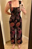Wow, what a disappointment. The material is as gorgeous as I hoped, and that's the only thing about this jumpsuit that didn't let me down. It was easily 4 inches too short in the length, showing my ankles, the waist was entirely square without shape, yet the material has little to no give so it flattened my chest. I had such high hopes for this and feel if at least the length had been appropriate I would have taken it in to get it altered, but with the chest being tight, the length so far off and the waist there was no saving it for me. I also felt the legs could be wider, and didn't like the pattern being slightly matched but just off from leg to leg. If the pattern had been mirrored or more random that would have worked.
This would definitely work for someone 5'4", with a square body type and smaller chest. On the right person I would imagine it'd be gorgeous, however not for an average height, hourglass shape. The photos aren't the right angle to show the length, sorry! Don't recommend for the price. - Tonya H.