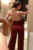 This jumpsuit is amazing! Love the adjustable straps on the top and it's fitted while still feeling like there's room to move around. Only downside is the legs are meant for a 6'5 person so I got them hemmed to fit me but that's no issue for me. Otherwise love the fit and style, it's thick enough not to show panty lines and I can't wait to wear it to an upcoming rehearsal dinner for a wedding. - Sydney D.