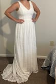 I'm so excited! This fit like a glove. No alterations needed. This is very flattering on my hourglass shape since it hugs my waist. I am a broader, large chested build and I was so happy to finally find a gown that flattered my figure. The train is very pretty, but not too long. I don't get snagged or trip in this dress. I'm 5'7" and I will wear 3 in heels to avoid having it hemmed. - Cary S.