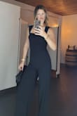 This jumpsuit was perfect. I wore it to a wedding that was held at somewhat of an informal venue. I'm tall so I did feel like the body was a tad short (kind of went up my backside a bit). But it fit great everywhere else. Very comfortable material. Very classy! - Roxanne L.