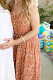This dress was perfect for a baby shower in Paso Robles (They didn't know the gender, so orange was a great choice). If I wore it with some high heels and a hat, I'd be ready for wine tasting! The reason why I'm giving it four stars is because I didn't like where the material cinched above my hips. It wasn't flattering in that area. - Jill D.