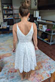 I'm 5'3" and while the dress is pretty, it just didn't look great on me. It made me look shorter. Heels might have been better, but I chose to wear flats with it! - Randi N.
