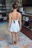 The material, like other reviews state, is prone to wrinkles and I just would never want to iron this if I took it on vacation. - Randi N.
