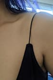 Form fitting and we'll made. Love the delicate thin straps. Makes a great closet staple! Love it and definitely recommend it! - Zsaleh R.