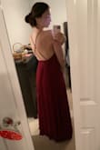 Love this dress! It's the perfect length and a beautiful color. It looks great with the tan. I would give it 5 stars but it was a little annoying having to put fashion tape under my armpits around my top side because the top wasn't completely covering me. The fashion tape wouldn't stay the whole time so I kept having to fix my top. You also have to wear a backless bra with it which got annoying towards the end of the night. Other than that I loved the dress! So pretty - Kaitlyn K.