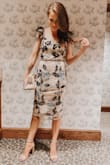 I wore this to a wedding and received so many complements! This dress made me feel so beautiful and feminine. If you can get your hands on it, buy it! It's true to size, and has just enough give to be able to boogie on the dance floor! - Courtney I.
