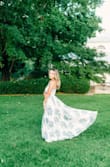Whatever you do, don't hesitate to buy this dress. Yes, it's a little on the pricey side, but I promise it's worth it! It was perfect for my engagement photos and I'm very happy with my choice! - Jillisa B.
