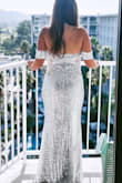 I ordered this in a size Small which is what I normally wear and while the body fit, I couldn't zip it up over my chest. I ordered the medium and it fits great! I wore this to a gala and received so many compliments. I wish I could wear this every day. - Sara R.