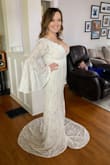I tried multiple dresses from a few different companies, and this was the one we compared every other dress to because it stood out from the very beginning. It is BEAUTIFUL. It is boho, but it also has a classic look to it. I can't believe the price for the quality of the dress! It is all lace, but it is SO soft and comfortable. I followed the measurement guide and ordered the large and it fits me like a glove. I am typically between a medium and a large in normal clothing, but usually closer to a medium. The lining is perfect--not too obvious but also full coverage. And the sleeves are GORGEOUS! I can't say enough good things about this dress. Can't wait to wear it for my wedding in December! - Lauren C.