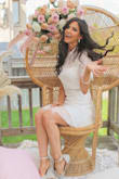 I bought this dress last minute for my bridal shower. I purchased based solely on the reviews and can honestly say I think it was a really great purchase. If you're looking for an elegant below the knee day-dress, you won't be disappointed. - Emalee F.
