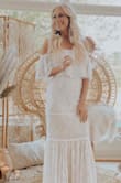 Purchased this for my bridal shower! Got so many compliments it was comfy and fit like a glove, the train was a bit annoying but other than that loved it! - Carly V.