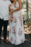 I purchased this dress for my engagement photos and absolutely LOVED IT! I'm normally a size large and a 36-38 D. The chest area did hook on but would snap off every once in a while but I loved the dress so much I left it open and can barely see the hook. Everything about the dress was beautiful! - Johanna C.