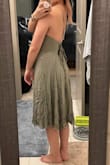 I like the look of this, but it definitely runs small. The suggested size for me was Small & I ordered Small & it barely fits. I can hardly breathe. The back is also very difficult to tie & I feel like I just yank it until it's closed, but then it doesn't look good after. Will try a larger size. - Elizabeth L.