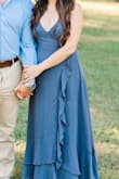 I was looking for a dress for my engagement pictures and this was perfect! It fits well, I just took a little off of the bottom so it wouldn't drag the floor with heels. - Brittany B.