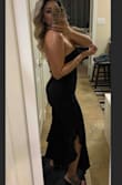 I love this jumpsuit is super cute and sexy. 
Have  a little be of stretch on it. - Elisandra O.