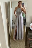 I absolutely LOVE this dress! I thought it would be my second choice, but as soon as I tried it on, my mind completely changed. It fits perfectly and I love the color. It's a classic dress with a twist due to the unique grey. - Madeline H.