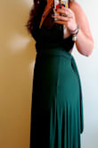 This dress is AMAZING! On the hanger it felt heavy, but once on it wasn't heavy at all! The material is super soft and stretchy. The color was PERFECT. I wore this for a formal wedding, but could absolutely be dressed down! Love how versatile the dress can be with the opened ended top! - Brittany A.
