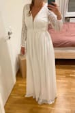 I ordered this dress for my civil wedding in Germany. It's perfect for my winter wedding and it looks exactly like it's shown in the pictures. It was very fast shipping. Only 5 days! The customs duties for shipping to Germany were 32.50 Euro. - Franziska D.