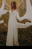 I wore this as my wedding dress for my elopement. I had tried on dresses at several bridal shops but did not want to shell out $1000+ for a dress. This dress fit beautifully, and was just a little long for my 3 inch booties (which could have been altered if I had time). I elevated the look with wings from made with love, but I'd suggest this dress to anyone! - Andi