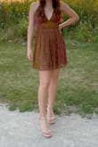 I wore this dress for homecoming and loved it! It's super light and comfortable, not itchy at all, and it has adjustable straps which was awesome since I have no boobs (dresses never fit me up top). The color shifting feature was pretty unique, the photos don't do it enough justice. No complaints from me! - Ella R.