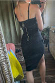 Love it! The dress is super soft and just stretchy enough to be comfortable. It's very easy to move in and not restrictive at all. I wanted a simple yet classy dress for a wedding I will be a guest at and can't wait to wear it! It's also lined so I don't have thong or bra lines. I have a small bust but I think even in this size with a bigger one it will stretch to accommodate and accentuate you curves! Very flattering neckline and really accentuates my waist and booty, makes me look curvier than I am. 
Also regarding the length, since I am average height I was concerned that it would be a bit long on me and hit me mid shin, which I personally am not a fan of as it makes my legs look shorter. This dress does not! The hem is right below my knee and the side slit is perfect, not too high when walking or dancing.
Also, the straps are adjustable!
 Overall I really couldn't be happier! Especially for the price, this is a quality dress. Hope this helps! - Leah T.
